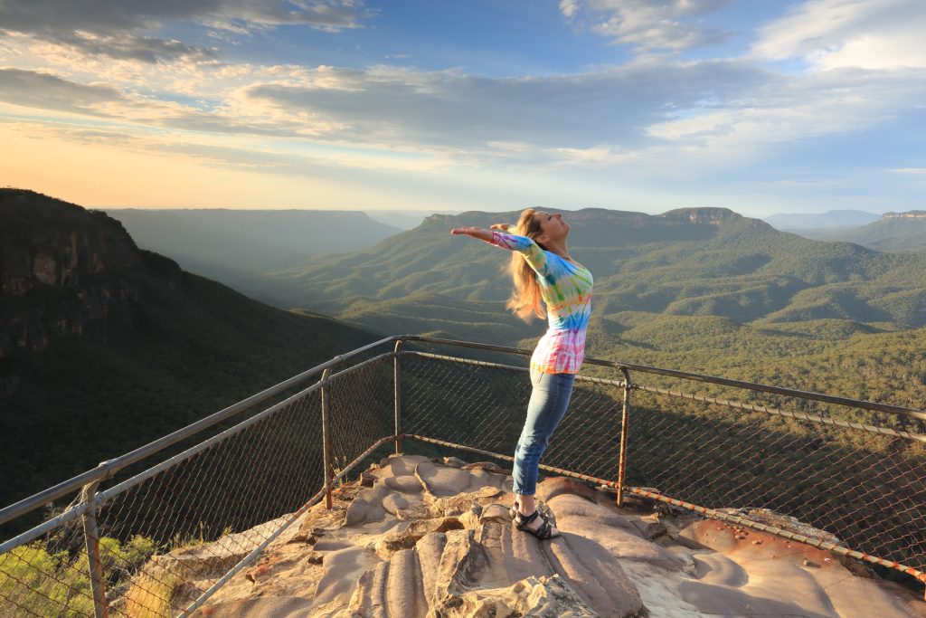 Positive female embracing the day image